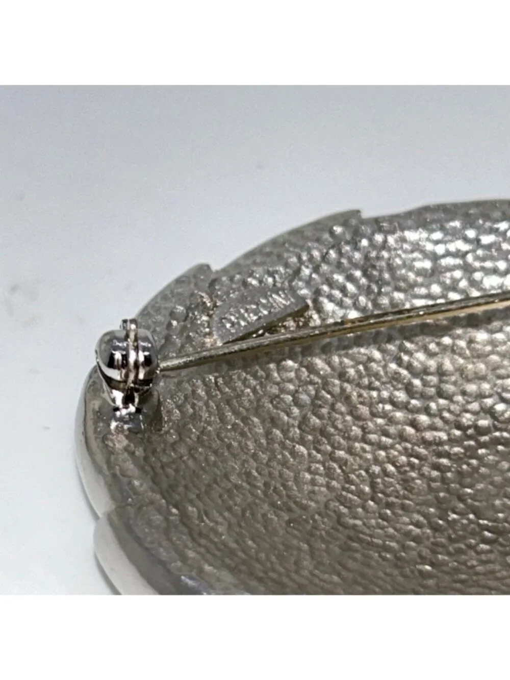 Vintage Puccini Silver-Tone Round Brooch With Textured White Center Statement